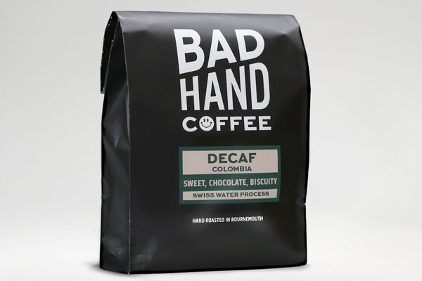 Bad Hand Coffee - Decaf from Colombia, decaffeinated using the Swiss water process - taste notes: sweet, chocolate, biscuity. Hand roasted and fresh to order. Available as whole bean or we can grind it to suit your home brew method. These one kilogram bags are 100% paper and home compostable.