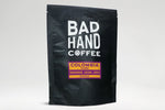 Bad hand coffee - Two fifty gramme postal bag of Columbia Viani, single origin coffee, with taste notes of tangerine, cacao and juicy. Hand roasted and fresh to order. Available as whole bean or we can grind it to suit your home brew method. These bags are 100% paper and home compostable.