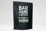 Bad Hand Coffee - Two fifty gramme postal bag of decaf from Peru, decaffeinated using the Swiss water process - taste notes: chocolate, nutty, rich. Hand roasted and fresh to order. Available as whole bean or we can grind it to suit your home brew method. These bags are 100% paper and home compostable.